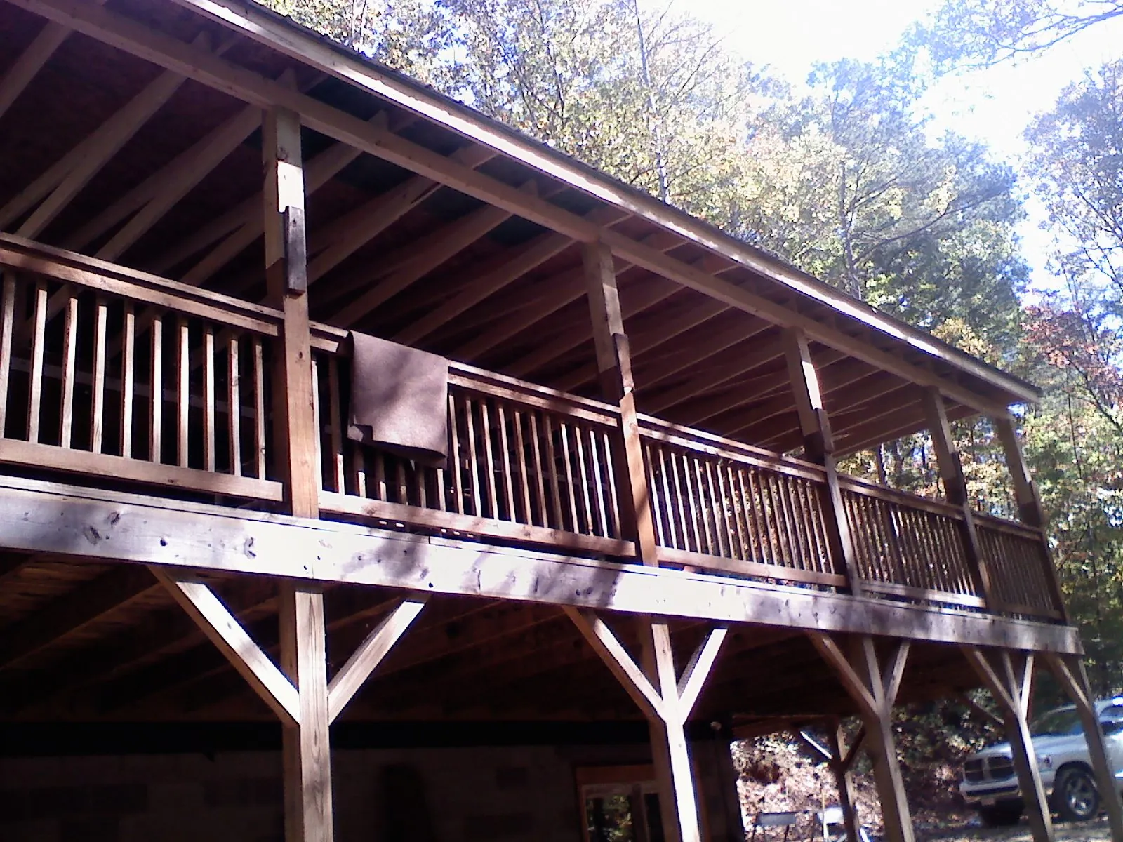 Timber framing under a new elevated porch and deck — Roof Leak Repair in Blue Mountain by Roofing Brothers